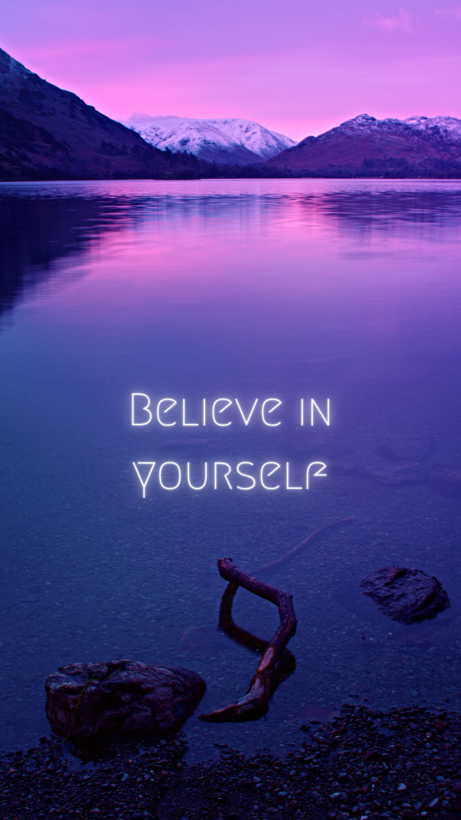 image of water near mountains and the words - believe in yourself